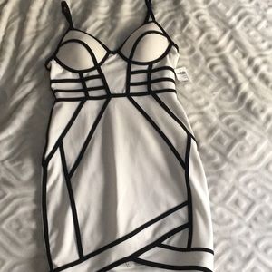 White bodycon party dress with black design